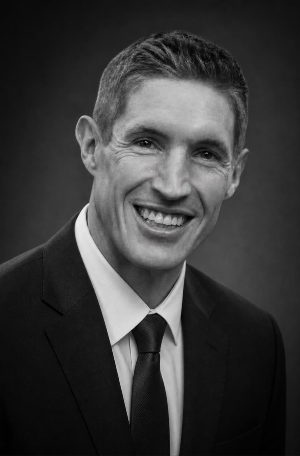 Portrait of Logan Fairfax, Case Manager at Shah Grossi Law & Counsel